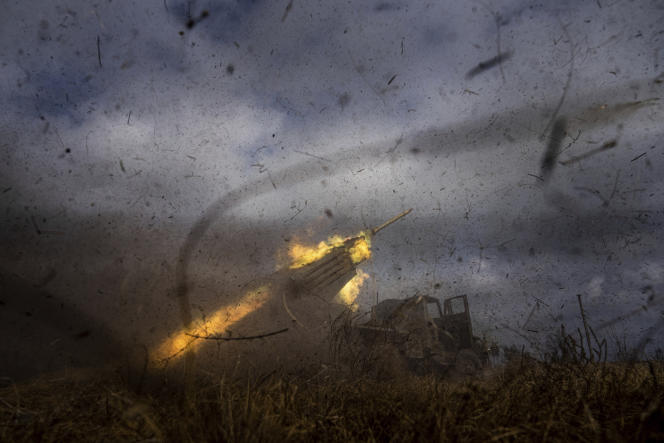 A Ukrainian rocket launcher fires towards Russian positions on the frontline near Kreminna, Ukraine, March 9, 2023.