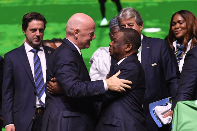 Gianni Infantino is congratulated by delegates after his re-election as head of FIFA, in Kigali on March 16, 2023.