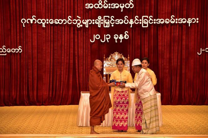 Buddhist monk Wirathu (left) awarded by General Min Aung Hlaing in Naypyidaw (Burma), January 2, 2023.