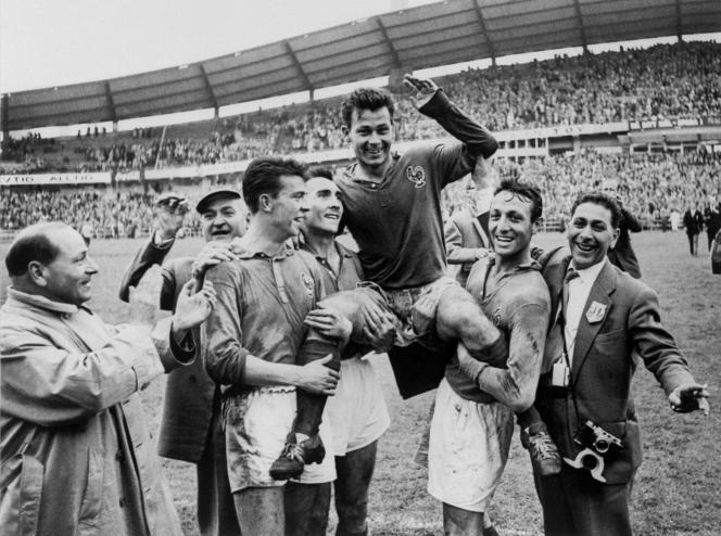French striker Just Fontaine, carried in triumph by his teammates Yvon Douis, André Lerond and Jean Vincent (from left to right) after scoring four goals against Germany, June 28, 1958, in Gothenburg.