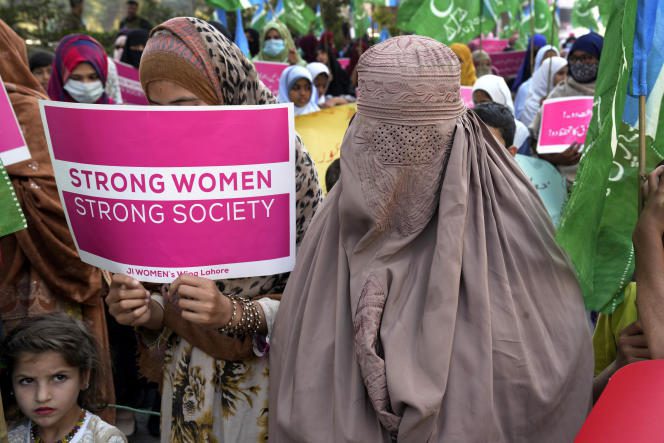 Women supporters of the religious party 'Jamaat-e-Islami' take part in a rally, in Lahore, Pakistan, Wednesday, March 8, 2023. 