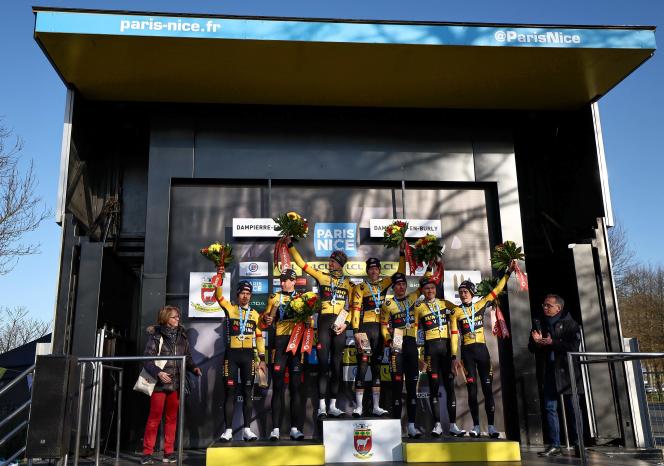 Riders of the Jumbo Visma team celebrate on the podium after winning the team time trial of the third stage of the Paris-Nice cycling race March 7. 