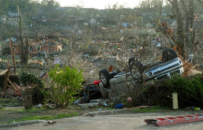   Homes and a car damaged by the tornado on March 31, 2023 in Little Rock, Arkansas, United States.