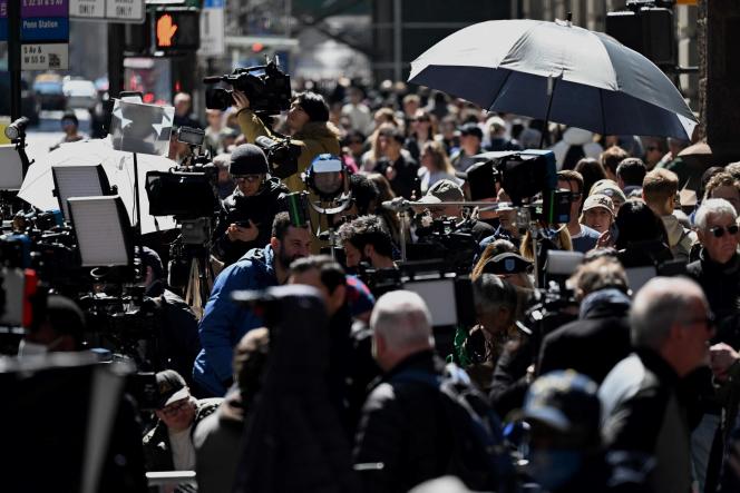 Dozens of members of news organizations and media posted outside Trump Tower in New York on April 3, 2023.