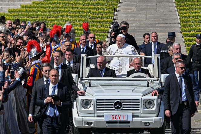 Pope Francis aboard his popemobile in St. Peter's Square, Rome, Sunday, April 9, 2023.