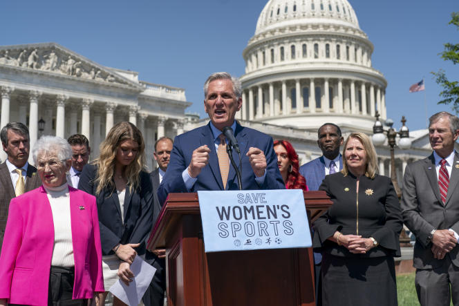 Republicans celebrate the passage of a bill banning trans women from joining women's teams in schools, April 20, 2023, in Washington.