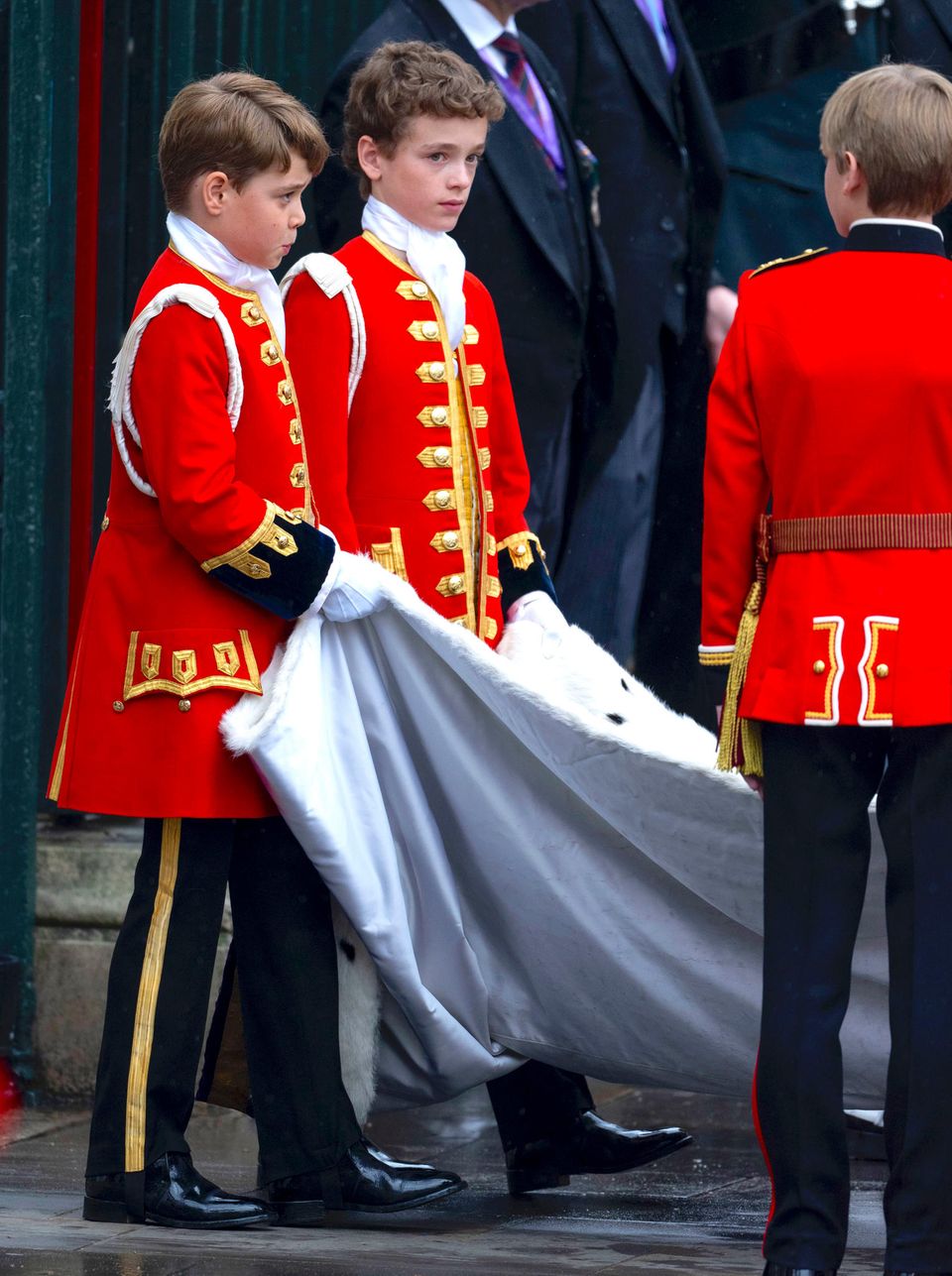 On Coronation Day, Prince George was page of honor alongside Nicholas Barclay, responsible for carrying King Charles' train.