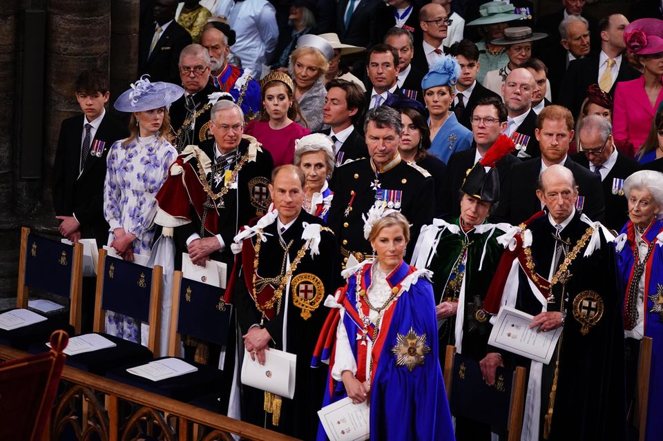 Zara and Mike Tindall sat behind Prince Harry at the coronation.