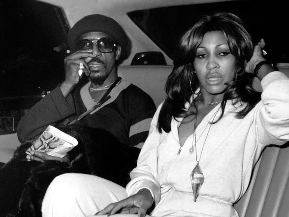 Ike and Tina Turner in a passenger car
