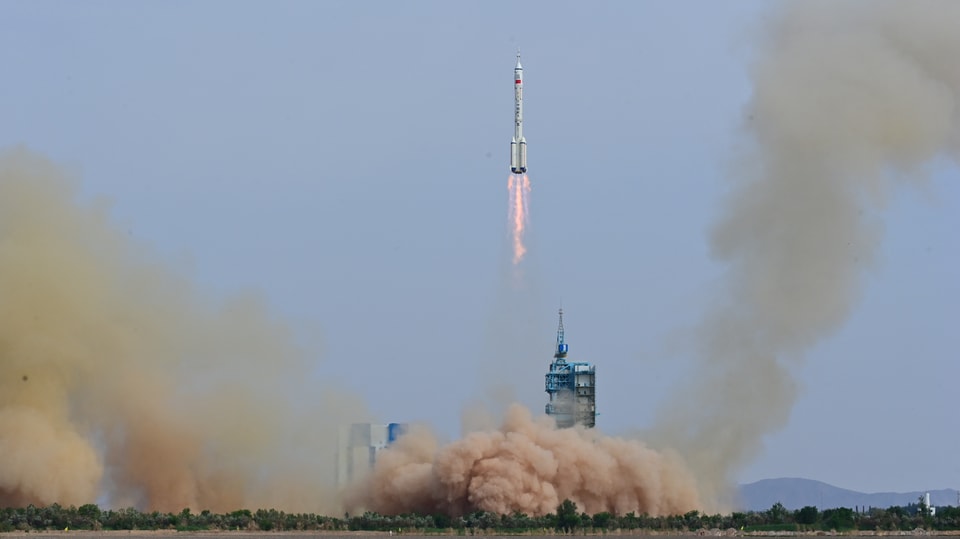 The rocket launch in the Gobi desert.