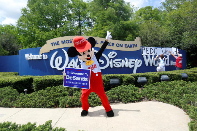 A supporter of Governor Ron DeSantis shows his support for Florida's Republican-backed 'Don't Say Gay' bill, which bans classroom teaching about sexual orientation and gender identity for many young people students, outside Walt Disney World in Orlando, Florida on April 16, 2022.