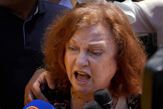 Mount Lebanon prosecutor Ghada Aoun responds to journalists leaving the Beirut courthouse on May 4, 2023.
