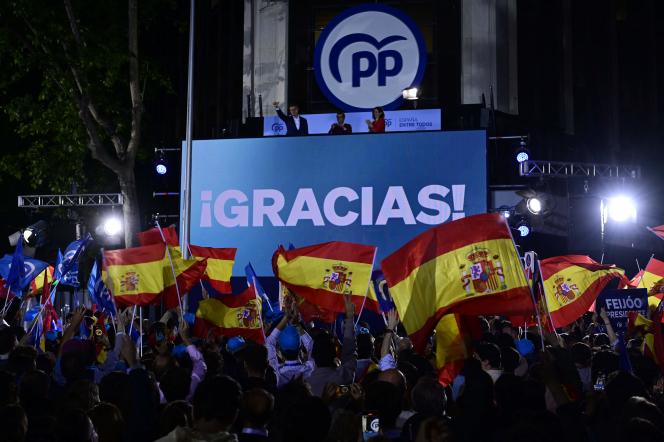 People's Party supporters gather to celebrate the election result outside the party's headquarters in Madrid on May 28, 2023.