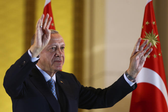 Recep Tayyip Erdogan waves to supporters at the presidential palace in Ankara, Turkey, May 28, 2023.