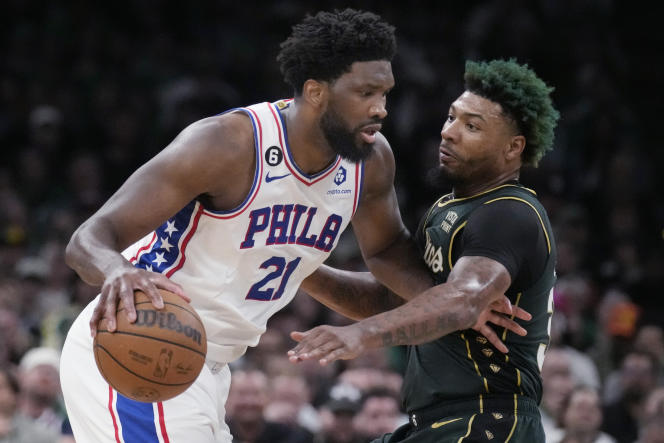 Joel Embiid (left) faces Marcus Smart in game 5 of the NBA playoffs Eastern Conference semifinals, in Boston, Wednesday, May 10, 2023. 