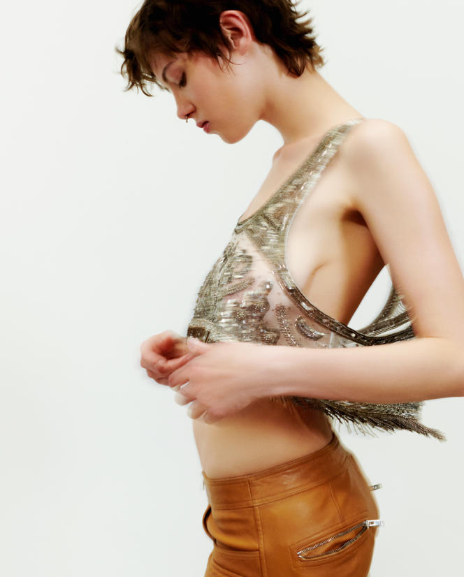 Embroidered mesh top, €1,600, and Isabel Marant trousers.  isabelmarant.com