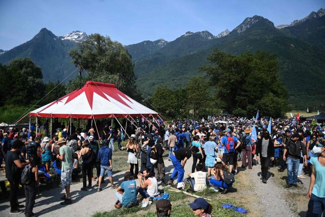 Protesters gather in a field during a demonstration against the construction of a high-speed rail line between Lyon and Turin, in La Chapelle, near Modane, in the Maurienne valley, on June 17, 2023. 