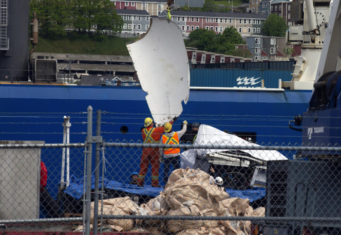 Debris from the Titan submarine being unloaded from a ship in the town of St. John's in Newfoundland, Canada.  June 28, 2023.