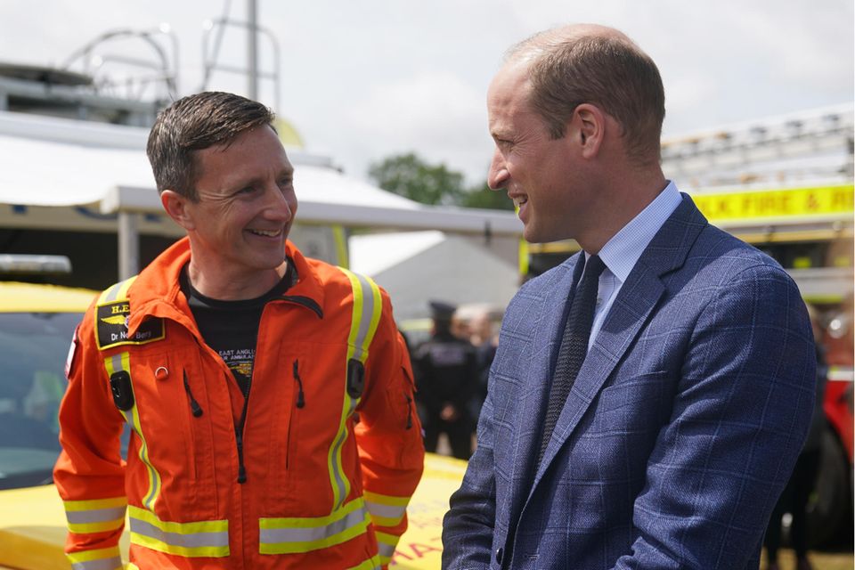 At an agricultural fair in Norfolk, Prince William meets doctor Neil Berry, with whom he worked on the East Anglian Air Ambulance.