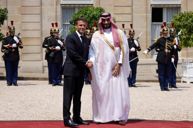 Emmanuel Macron and Saudi Crown Prince Mohammed Ben Salman at the Elysee Palace on June 16, 2023.