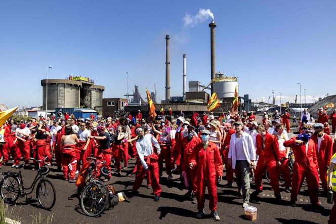 Greenpeace activists demonstrate at a metallurgical site of steel giant Tata Steel, in Velsen near Amsterdam, the Netherlands, June 24, 2023.