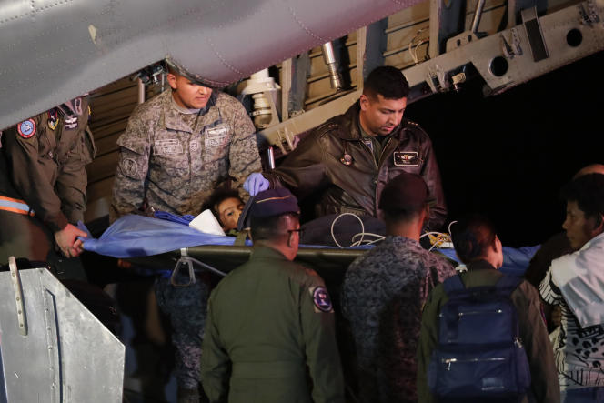 Military personnel care for one of four children found after a small plane crashed, at the military airbase in Bogota, Colombia, June 10, 2023.