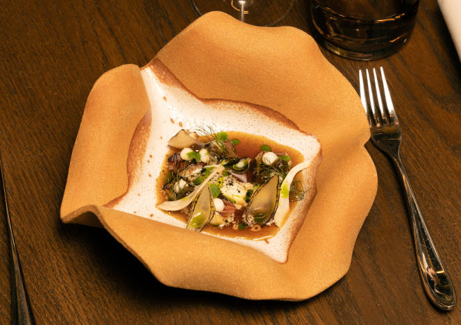 Chef Matan Zaken's smoked eel, served at the Nohme restaurant in Paris, April 26, 2023.