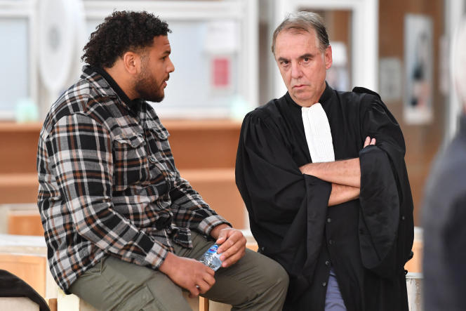 French international rugby player Mohamed Haouas and his lawyer during his trial at the Montpellier courthouse on May 12, 2023. 