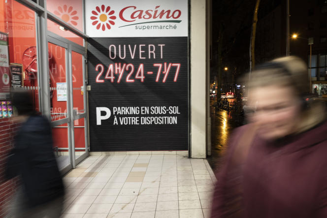 In front of the entrance to a Casino supermarket, in Lyon, on March 15, 2019.