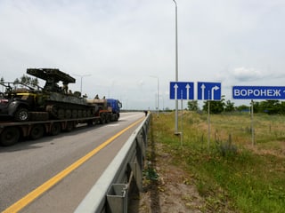 A truck transporting a military vehicle belonging to the private mercenary group Wagner drives along the M-4 motorway.  The M-4 connects the capital Moscow with the southern cities of Russia (06/24/23).