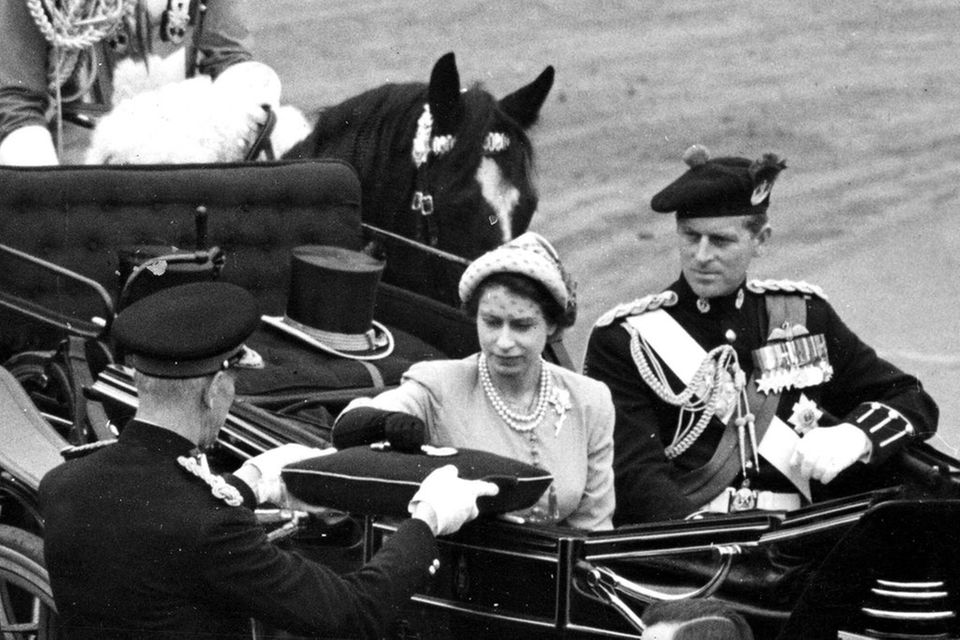 Queen Elizabeth II and her husband Prince Philip in June 1953 as part of the coronation celebrations in Edinburgh, Scotland.