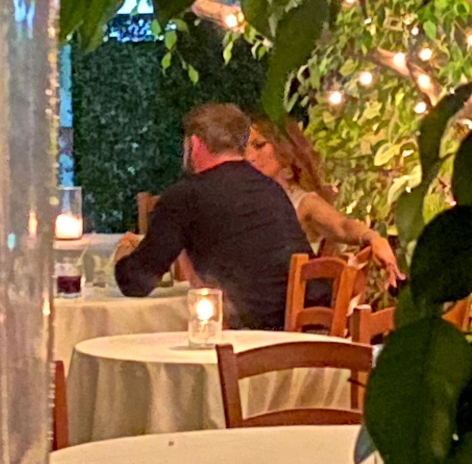 Finally, Ben Affleck and Jennifer Lopez enjoy a candlelit dinner together.