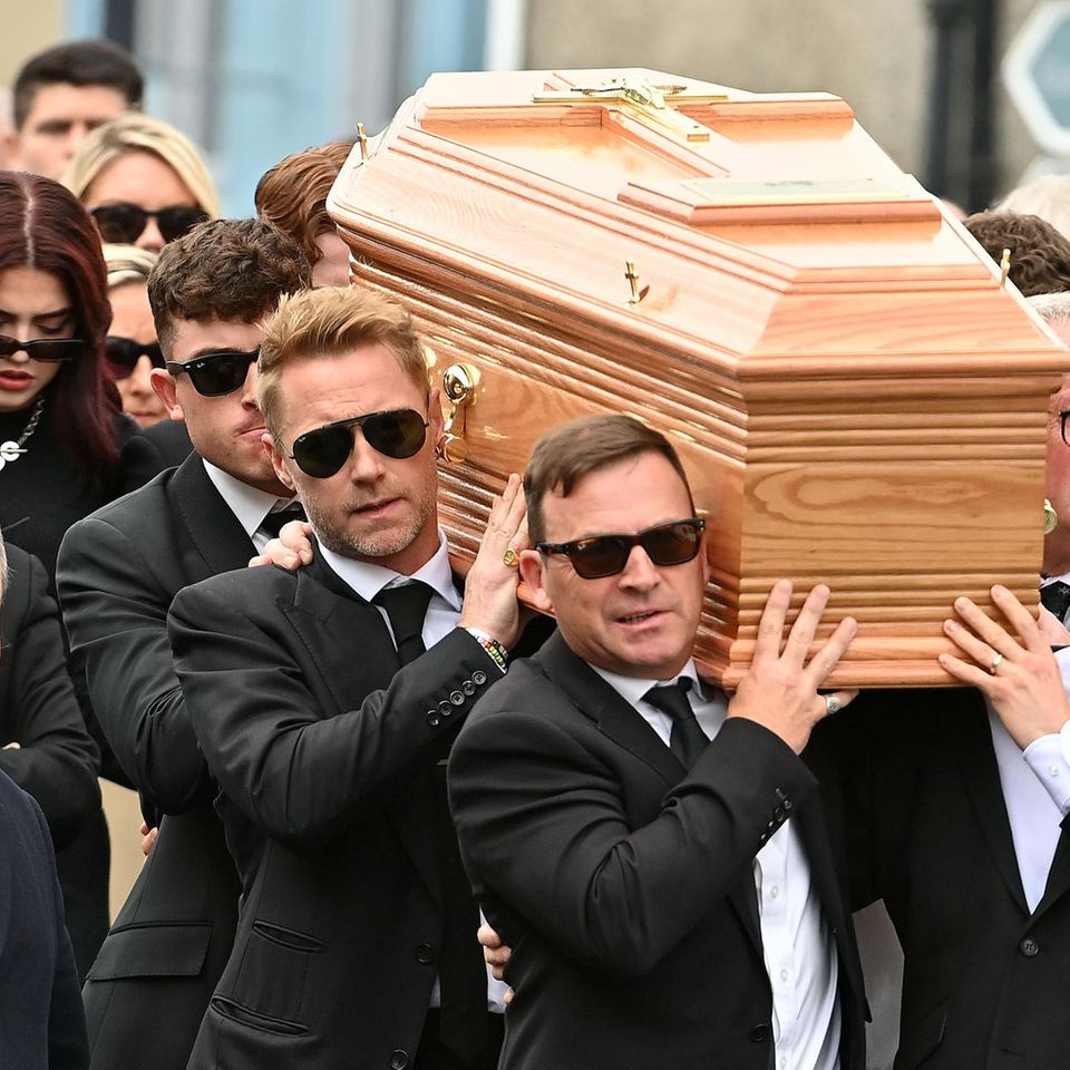 Ronan Keating carries the coffin of his late brother Ciaran Keating on July 20, 2023 in Louisburgh, Ireland.