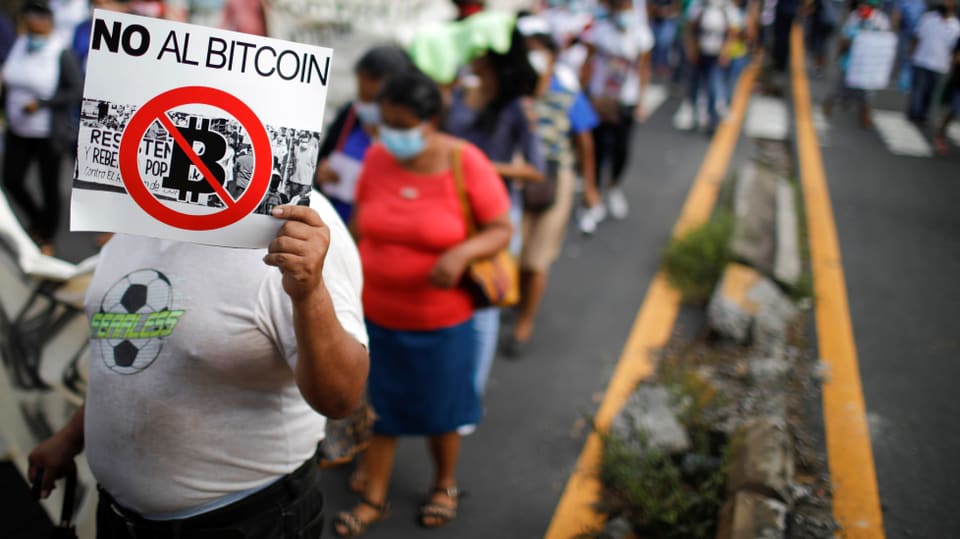 People protest against the introduction of bitcoin