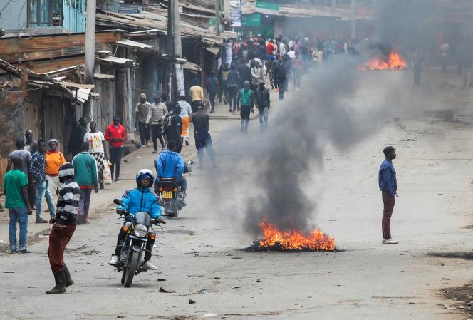 Tires set on fire by protesters in the Kibera slum, Kenya, during a protest against government tax hikes, in Nairobi on July 19, 2023.
