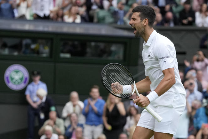 Serbian Novak Djokovic celebrates his victory against Russian Andrey Rublev, for the ninth day of the Wimbledon tennis tournament in London, Tuesday July 11, 2023. 