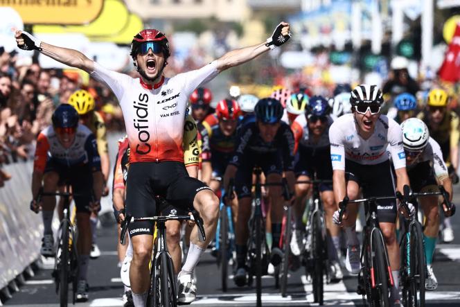 Frenchman Victor Lafay (Cofidis) savors his victory ahead of Wout van Aert and Tadej Pogacar (right) during the second stage of the Tour de France, in San Sebastian (Spain), July 2, 2023.