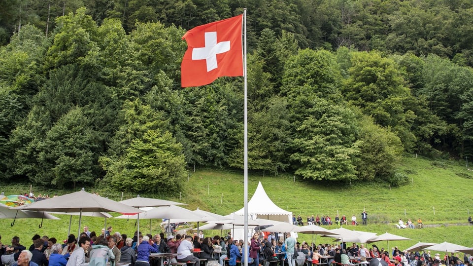 The Swiss flag flies on the Rütli