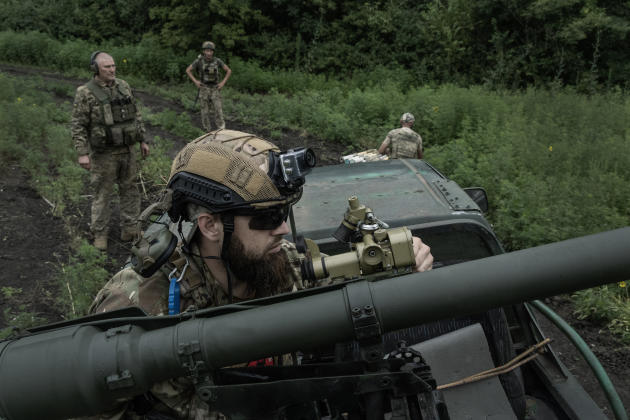 Mobile gunners from a Ukrainian motorized brigade position themselves to fire rockets at Russian machine gun operators, north of Bakhmout, Ukraine, July 23, 2023.