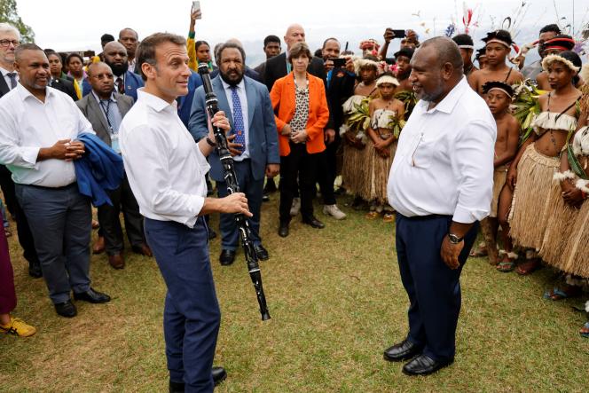 Emmanuel Macron and Papua New Guinean Prime Minister James Marape at Varirata National Park near Port Moresby on July 28, 2023.
