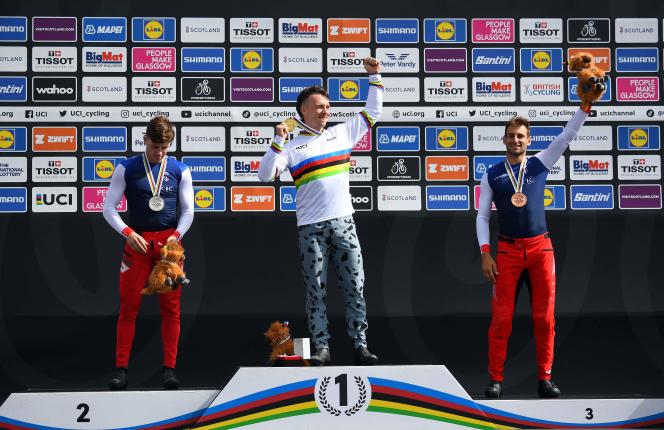 Romain Mahieu celebrates his gold medal in BMX Race, during the UCI Cycling World Championships, in Glasgow, Scotland, August 13, 2023. Frenchmen Arthur Pilard and Joris Daudet complete the podium.