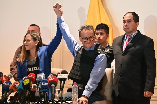 Journalist and presidential candidate of the Construye party, Christian Zurita (middle), and his running mate Andrea Gonzalez, during a press conference at a hotel in Guayaquil, Ecuador, August 16, 2023.