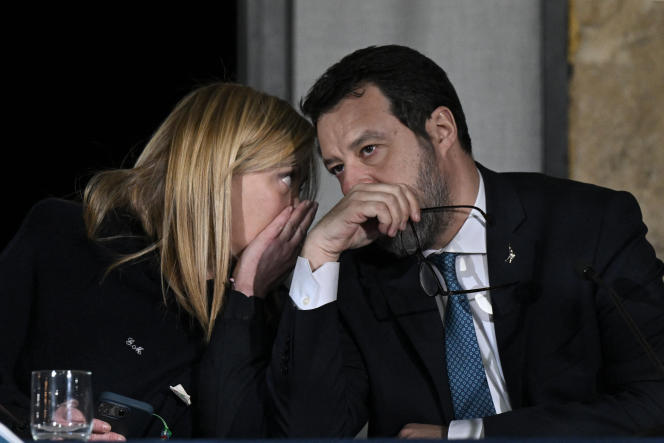Italian Prime Minister Giorgia Meloni (left) speaks with Deputy Prime Minister and Infrastructure Minister Matteo Salvini during a press conference following a Council of Ministers held on March 9 2023 in the hall of the town council of the town of Cutro (Italy).
