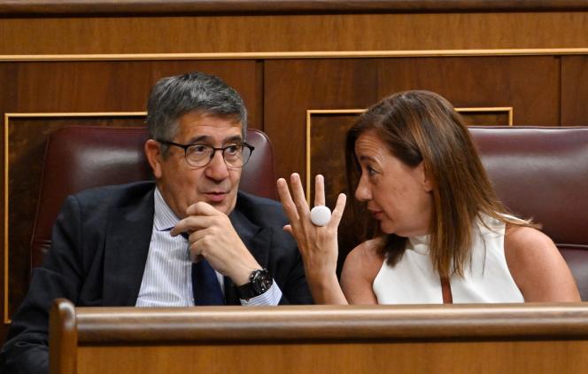 The Socialist Group's candidate for the presidency, Francina Armengol, speaks with Socialist MP Patxi Lopez during the constituent session of Parliament at the Congress of Deputies, in Madrid, on August 17, 2023.