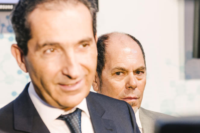 Altice CEO Patrick Drahi and Armando Pereira, one of the group's three co-founders, at the inauguration of Altice Labs, the company's research and development center, in Portugal, January 20, 2016. 