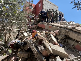 Rescue workers are searching for survivors in the rubble.