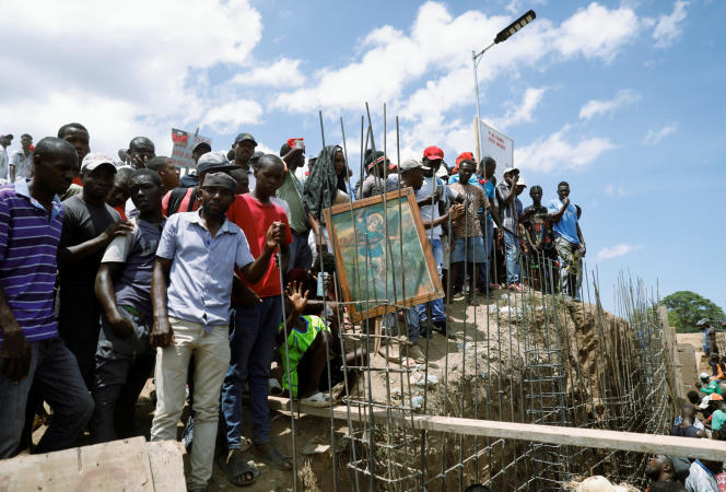 Haitians gathered at the construction site of a water canal for the Massacre River, shared between Haiti and the Dominican Republic, in Ouanaminthe (Haiti), September 14, 2023.