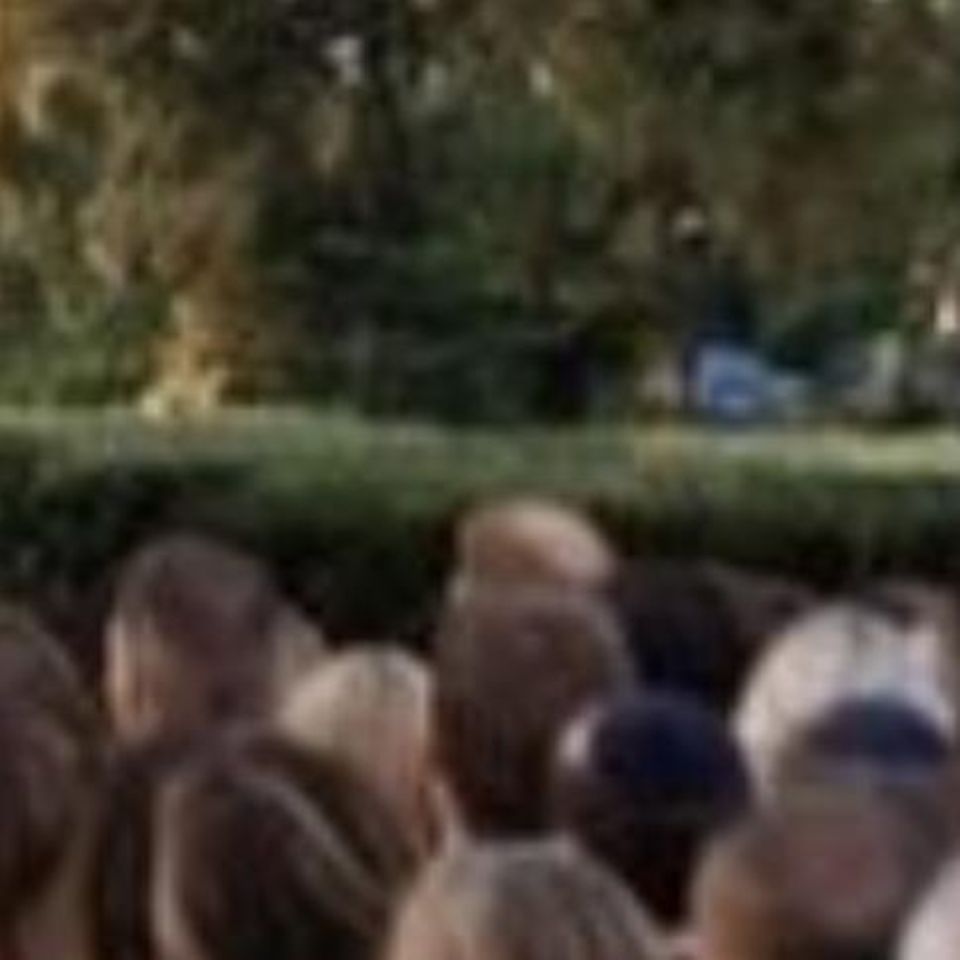 Prince Harry's redhead might be visible in the crowd in the wedding photo.