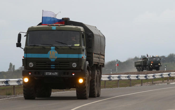 Russian military trucks head towards the Armenia-Azerbaijan border near the village of Kornidzor, September 23, 2023.