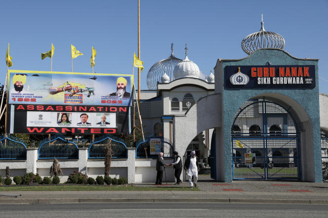 A poster denounces India's role in the assassination of Hardeep Singh Nijjar, outside the Sikh temple he led in Surrey, British Columbia, September 18, 2023.